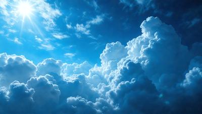 The primary subject of the image is a cloudy sky filled with numerous white clouds. The setting is a blue sky, which provides a contrasting backdrop for the clouds. The visual style of the image is a photo, capturing the beauty of the cloudy sky. The colors and mood of the image are predominantly white and blue, creating a serene and peaceful atmosphere.