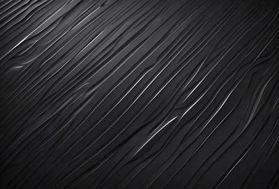 The primary subject of the image is a black and white pattern, which appears to be a textured surface or a patterned wall. The setting is a black background, which contrasts with the patterned surface. The visual style of the image is a close-up of the pattern, showcasing its intricate details. The colors and mood of the image are predominantly black and white, giving it a classic and timeless feel.