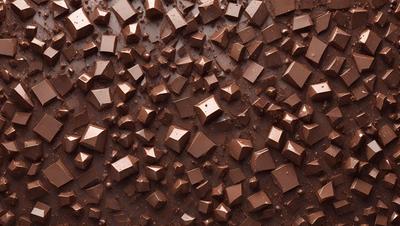 The primary subject of the image is a close-up of a chocolate-covered candy, which is the main focus of the image. The setting is a table with a chocolate-covered surface, which serves as the backdrop for the candy. The visual style of the image is a close-up of the candy, showcasing its texture and details. The colors in the image are predominantly brown, which gives the image a warm and inviting atmosphere.