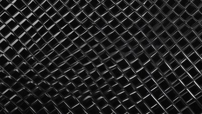 The primary subject of the image is a close-up of a black mesh or grate. The setting is a dark background, which contrasts with the black mesh. The visual style appears to be a pattern or texture, possibly a digital art or illustration. The dominant colors are black, and the overall atmosphere is mysterious and intriguing.