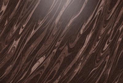 The primary subject of the image is a wooden surface with a unique and intricate pattern. The setting is a room with a wooden floor, and the visual style appears to be a close-up of the wooden surface. The colors and mood of the image are predominantly brown, giving it a warm and natural atmosphere.