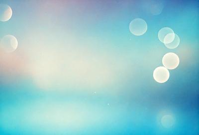 The primary subject of the image is a blue sky with a few white dots scattered throughout. The setting is a clear day with a cloudy background. The visual style is a combination of a photo and digital art, creating a unique and artistic representation of the sky. The colors and mood of the image are predominantly blue and calm, with the white dots adding a touch of contrast and interest.