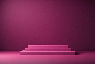 The primary subject of the image is a pink wall. The setting is a room with a pink wall, and the visual style is a photo. The dominant colors in the image are pink, and the overall atmosphere is warm and inviting.