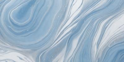 The primary subject of the image is a blue and white swirling pattern, which appears to be a digital art or illustration. The setting is a blue background, and the visual style is a combination of digital art and illustration. The dominant colors are blue and white, creating a calm and soothing atmosphere.