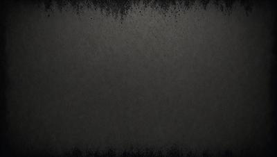 The primary subject of the image is a black and white photo of a wall. The setting is a room with a wall that appears to be made of stone or concrete. The visual style is a close-up of the wall, showcasing its texture and details. The colors and mood of the image are predominantly dark and moody, with the black and white color scheme adding to the dramatic atmosphere.