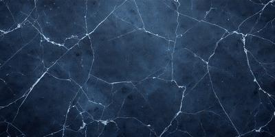 The primary subject of the image is a blue marble wall with a pattern of white and grey veins. The setting is a room with a blue background, and the visual style is a close-up of the marble wall. The colors and mood of the image are predominantly blue, with the white and grey veins adding a touch of contrast and texture to the overall atmosphere.