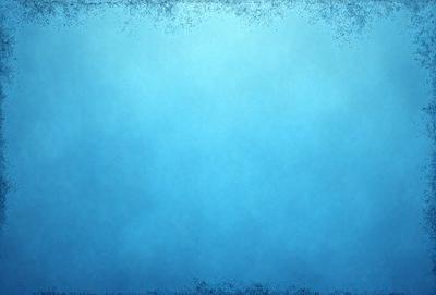 The primary subject of the image is a large, empty blue space. The setting is a blue background, which creates a sense of depth and openness. The visual style is a combination of a photo and digital art, as the blue background appears to be digitally created. The colors and mood of the image are predominantly blue, which gives it a calm and serene atmosphere.