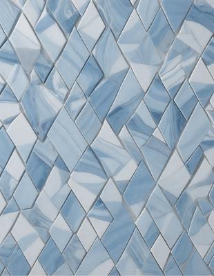 The primary subject of the image is a blue and white tile wall. The setting is a room with a blue and white tile wall as the main focus. The visual style is a photo of the tile wall. The dominant colors are blue and white, creating a calm and soothing atmosphere.