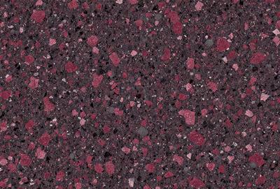 The primary subject of the image is a close-up of a red and black marbled surface, which appears to be a patterned stone or a textured wall. The setting is a dark room, and the visual style is a close-up of the marbled surface. The dominant colors in the image are red and black, creating a bold and striking appearance.