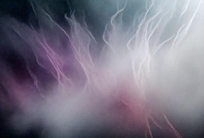 The primary subject of the image is a purple and pink background with a cloudy texture. The setting is a purple and pink sky, which creates a unique and artistic visual style. The colors and mood of the image are vibrant and lively, with a sense of movement and dynamism.