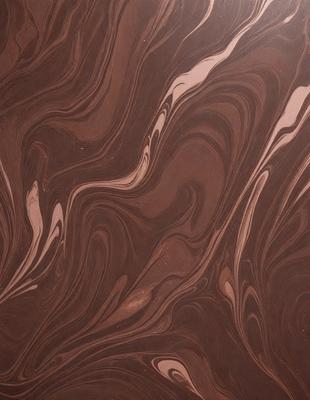 The primary subject of the image is a wooden surface with a marbled pattern. The setting is a room with a wooden floor, and the visual style is a close-up of the wooden surface. The colors and mood of the image are warm and natural, with the wooden surface being the main focus.