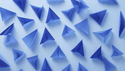 The primary subject of the image is a large number of blue triangles, which are arranged in various orientations and sizes. The setting is a white background, which provides a clean and uncluttered appearance. The visual style is a combination of digital art and illustration, as the triangles are created using a computer program or digital drawing tool. The colors and mood of the image are predominantly blue, which gives it a calm and soothing atmosphere.