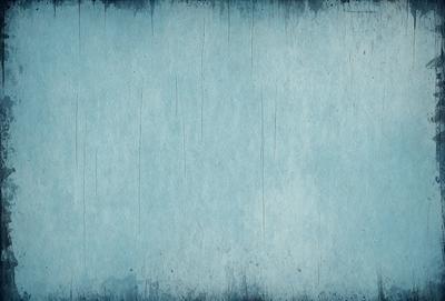 The primary subject of the image is a blue wall with a textured surface. The setting is a room with a blue wall, and the visual style is a photo. The dominant colors are blue and white, creating a calm and serene atmosphere.