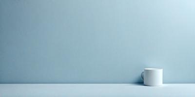The primary subject of the image is a white cup placed on a blue surface. The setting is a blue wall, and the visual style appears to be a photo. The dominant colors in the image are blue and white, creating a calm and serene atmosphere.