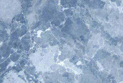 The primary subject of the image is a marble-like surface with a blue hue. The setting is a blue background, which creates a visually appealing contrast with the surface. The visual style is a combination of a photo and a digital art, as it appears to be a close-up of the marble surface with a slightly blurred background. The colors and mood of the image are predominantly blue, giving it a calm and serene atmosphere.