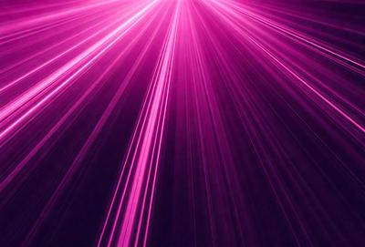 The primary subject of the image is a pink light, which appears to be a neon light or a purple light. The light is shining brightly, creating a vibrant and colorful atmosphere. The setting is a dark background, which contrasts with the bright light, making it stand out even more. The visual style of the image is a close-up of the light, emphasizing its vividness and intensity. The colors and mood of the image are predominantly pink and purple, giving it
