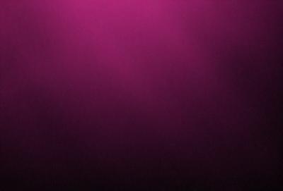 The primary subject of the image is a purple wall. The setting is a dark room, and the visual style appears to be a photo. The dominant colors are purple and black, creating a moody atmosphere.