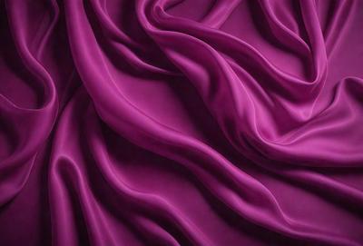 The primary subject of the image is a purple fabric, which is the main object, scene, or focus of the image. The setting or background is a purple sheet, and the visual style is a photo. The colors and mood of the image are predominantly purple, creating a calm and serene atmosphere.