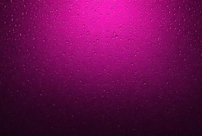 The primary subject of the image is a purple surface with water droplets on it. The setting is a purple background, and the visual style is a close-up of the purple surface. The colors and mood of the image are predominantly purple, creating a calm and serene atmosphere.