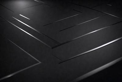 The primary subject of the image is a black and white pattern, which appears to be a close-up of a black surface. The setting is a dark room, and the visual style is a black and white photo. The dominant colors are black and white, creating a moody and dramatic atmosphere.