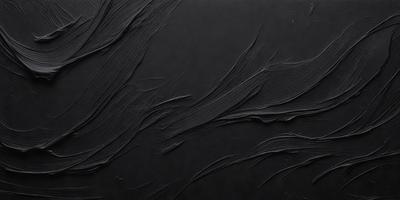 The primary subject of the image is a black background with a pattern of swirls and curves. The setting is a dark room, and the visual style appears to be a combination of a photo and a drawing. The colors and mood of the image are predominantly dark and moody, with the swirls and curves creating a sense of depth and intricacy.