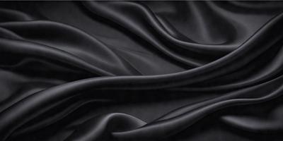 The primary subject of the image is a black fabric, which is the main object, scene, or focus of the image. The setting or background is a black cloth, and the visual style is a photo. The colors and mood of the image are predominantly black, creating a dark and moody atmosphere.
