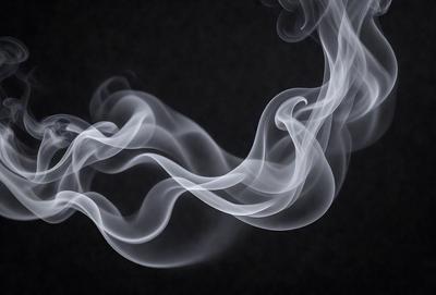 The primary subject of the image is a large, swirling cloud of smoke. The setting is a dark background, which contrasts with the smoke, making it the focal point of the image. The visual style is a close-up of the smoke, emphasizing its texture and movement. The colors and mood of the image are predominantly dark, with the smoke being the only light source, creating a dramatic and moody atmosphere.