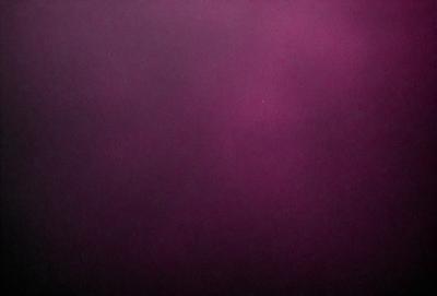 The primary subject of the image is a purple background. The setting is a dark, purple-colored room. The visual style is a close-up of the purple background, which creates a moody and dramatic atmosphere.