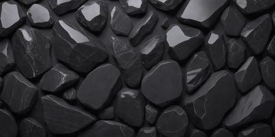 The primary subject of the image is a large black rock, which is the main object in the scene. The rock is placed on a black surface, which serves as the setting or background. The visual style of the image is a close-up of the rock, showcasing its texture and details. The dominant colors in the image are black, which creates a moody and dramatic atmosphere.