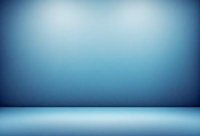 The primary subject of the image is a large, empty room with a blue wall. The setting is a room with a blue wall, and the visual style is a photo. The colors and mood of the image are predominantly blue, creating a calm and serene atmosphere.