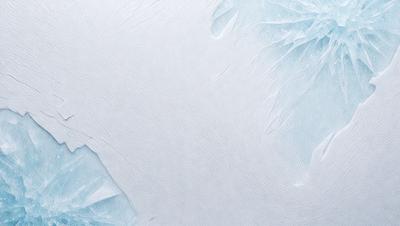 The primary subject of the image is a white surface, possibly a wall or a piece of paper. The setting is indoors, with the white surface being the main focus of the image. The visual style appears to be a close-up of the white surface, with no indication of it being a photo, digital art, illustration, drawing, pattern, texture, or clipart. The colors and mood of the image are predominantly white, giving it a clean and minimalist appearance.