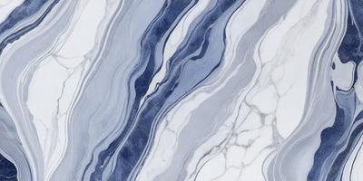 The primary subject of the image is a marble tile with a blue and white pattern. The setting is a bathroom, as indicated by the presence of the marble tile. The visual style is a photo, showcasing the intricate design of the tile. The dominant colors are blue and white, creating a clean and elegant atmosphere.