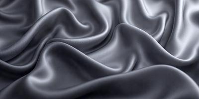 The primary subject of the image is a close-up of a piece of fabric, likely leather, with a wrinkled texture. The setting is a dark background, which emphasizes the fabric's texture and color. The visual style is a close-up, focusing on the fabric's details. The colors and mood of the image are dark and moody, with the fabric's color being the main focus.