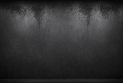 The primary subject of the image is a black and white photo of a wall. The setting is a dark room with a gray wall. The visual style is a black and white photo, which gives the image a classic and timeless appearance. The colors and mood are predominantly dark and moody, with the gray wall and black and white photo creating a sense of depth and contrast.