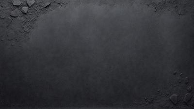 The primary subject of the image is a large, empty, and dark gray surface. The setting is a black background, and the visual style is a photo. The colors and mood of the image are dark and moody, with the gray surface creating a sense of emptiness or mystery.