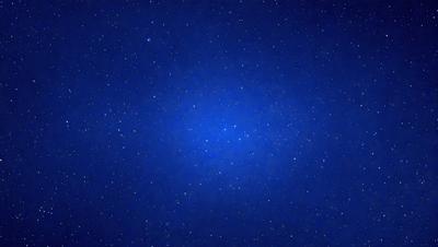 The primary subject of the image is the night sky, which is filled with stars. The setting is a dark, star-filled sky, and the visual style is a photo of the night sky. The colors and mood of the image are predominantly dark and serene, with the stars providing a sense of depth and beauty.