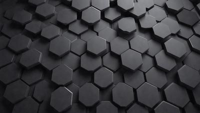 The primary subject of the image is a black and white pattern of hexagons. The setting is a black background, and the visual style appears to be a digital art or illustration. The dominant colors are black and white, creating a bold and striking pattern. The overall atmosphere of the image is modern and minimalistic.