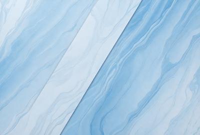 The primary subject of the image is a blue and white marble tile. The setting is a wall with the tile placed on it. The visual style is a close-up of the tile, showcasing its intricate design. The dominant colors are blue and white, creating a clean and elegant atmosphere.
