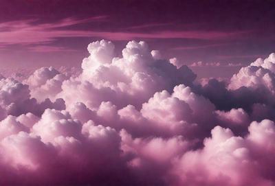 The primary subject of the image is a cloudy sky filled with various cloud formations. The setting is a pink sky, which adds a unique and vibrant atmosphere to the scene. The visual style of the image is a combination of photo and digital art, creating a captivating and artistic representation of the cloudy sky. The colors and mood of the image are predominantly pink, giving it a warm and serene ambiance.