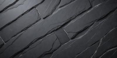 The primary subject of the image is a black stone wall. The setting is a dark room, and the visual style is a close-up of the stone wall. The colors and mood of the image are dark and moody, with the black stone wall as the main focus.