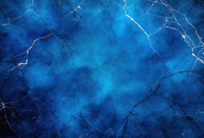 The primary subject of the image is a blue marble wall with a cracked texture. The setting is a room with a blue background. The visual style is a close-up of the marble wall, showcasing its unique texture. The dominant colors are blue and white, creating a calm and serene atmosphere.