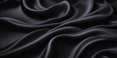 The primary subject of the image is a black fabric, which appears to be a piece of clothing or a curtain. The setting is a dark room, and the visual style is a close-up of the fabric. The colors and mood of the image are predominantly dark and moody, with the black fabric being the main focus.
