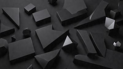 The primary subject of the image is a collection of black geometric shapes, including triangles and squares, arranged on a black background. The visual style of the image is a combination of photo and digital art, creating a striking contrast between the shapes and the background. The colors and mood of the image are predominantly black, giving it a sleek and modern appearance.