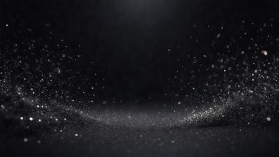 The primary subject of the image is a black background with a pattern of white specks or sparkles. The setting appears to be a dark room, and the visual style is a close-up of the speckled pattern. The colors and mood of the image are predominantly dark and moody, with the white specks providing a contrasting and intriguing element.