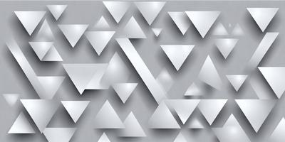 The primary subject of the image is a large, intricate pattern made up of many triangles. The pattern is composed of various shapes and sizes of triangles, creating a visually striking and complex design. The setting is a gray background, which provides a neutral and clean environment for the pattern to stand out. The visual style of the image is a combination of digital art and illustration, as the triangles are carefully arranged and crafted to create a cohesive and harmonious design. The colors and mood of the image are