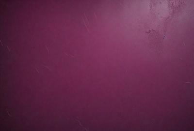 The primary subject of the image is a purple wall with a few white lines on it. The setting is a room with a purple wall, and the visual style appears to be a photo. The dominant colors are purple and white, creating a calm and soothing atmosphere.