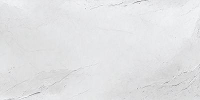 The primary subject of the image is a white wall with a textured surface. The setting is a room with a white background. The visual style is a close-up of the wall, which gives a sense of depth and texture. The colors and mood of the image are predominantly white, creating a clean and minimalist atmosphere.