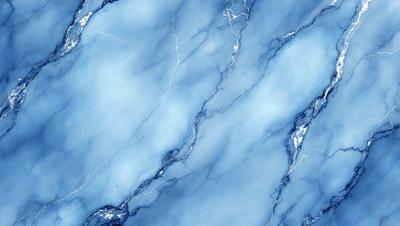 The primary subject of the image is a marble wall with a blue and white color scheme. The setting is a room with a blue and white marble wall, which serves as the background. The visual style is a close-up of the marble wall, showcasing its intricate patterns and textures. The colors and mood of the image are predominantly blue and white, creating a serene and elegant atmosphere.