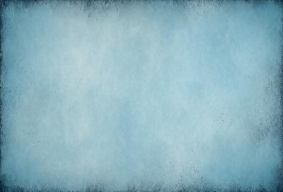 The primary subject of the image is a large, blue, textured surface. The setting is a blue sky, and the visual style appears to be a combination of a photo and a digital art or illustration. The colors and mood of the image are predominantly blue, creating a calm and serene atmosphere.