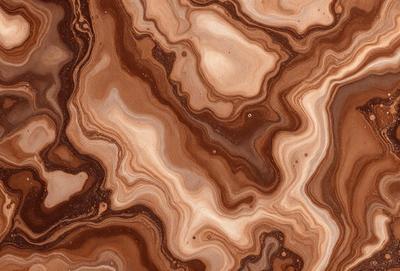 The primary subject of the image is a close-up of a marble stone with a brown and red color palette. The setting is a natural environment, with the stone being the main focus of the scene. The visual style is a close-up of the stone, showcasing its intricate patterns and textures. The colors and mood of the image are warm and earthy, with the brown and red hues evoking a sense of natural beauty and richness.